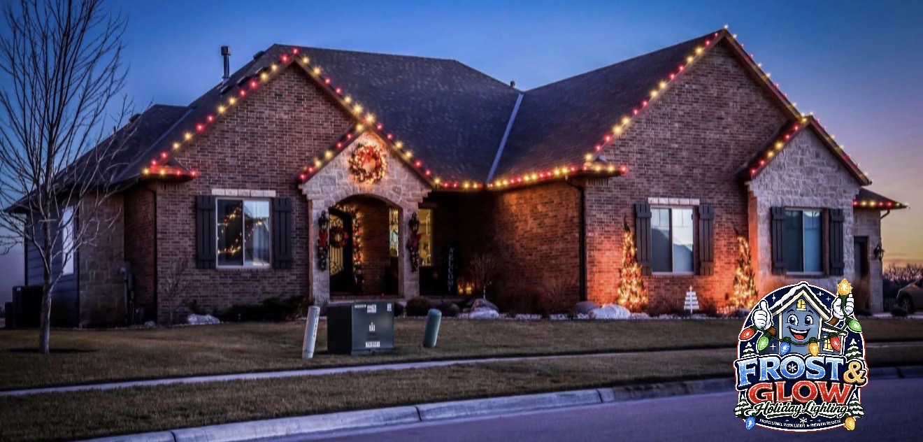 Alternating red and warm-white bulbs follow every peak, with a lit wreath completing the front entry.